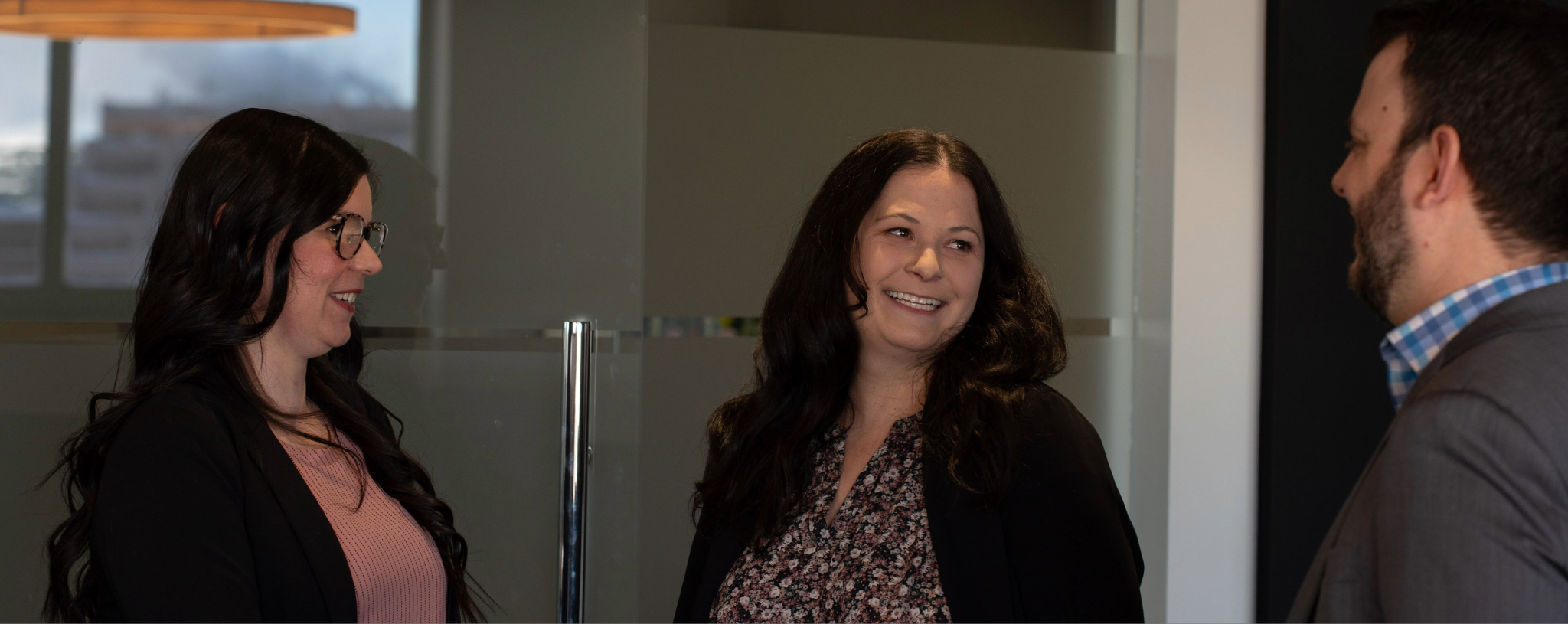 Lawyers meeting with a client to review documents