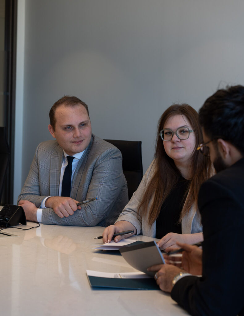 Civil litigation lawyers meeting with clients